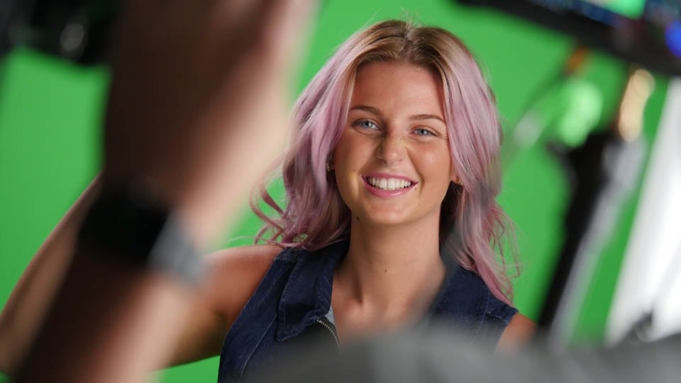 Galleon Studios For Green Screen Filming Girl has photo taken on Galleon Studios green screen